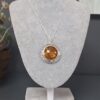 Screenshot Sterling Silver Amber Round Pendant