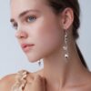 ZE0108 MODEL Polished Long Drop Scroll Earrings